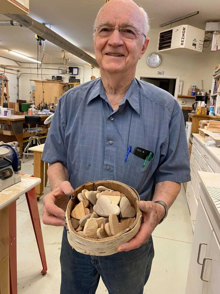 THIS MAN MAKES THOUSANDS OF TINY WOODEN HEARTS FOR STRANGERS—BUT HE ONLY EVER KEPT ONE
