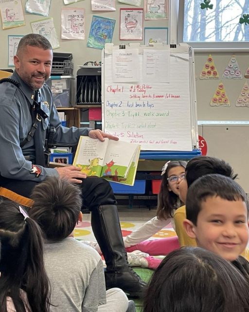 The Kids Were Scared Of Me In Uniform—So I Showed Up With A Book Instead