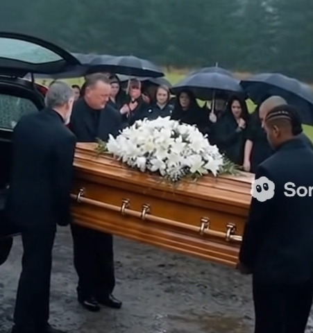 During The Funeral, Just As The Coffin Was Placed Into The Hearse