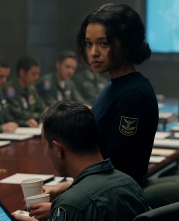 She Was Just Fetching Coffee For The Officers… Until The Pilot Noticed The Patch On Her Sleeve—And Suddenly Everyone Stopped Breathing