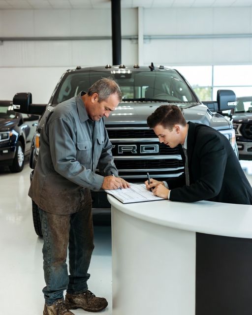 The Salesman Laughed At My Muddy Boots. Then I Wrote A Check For Ten Trucks.